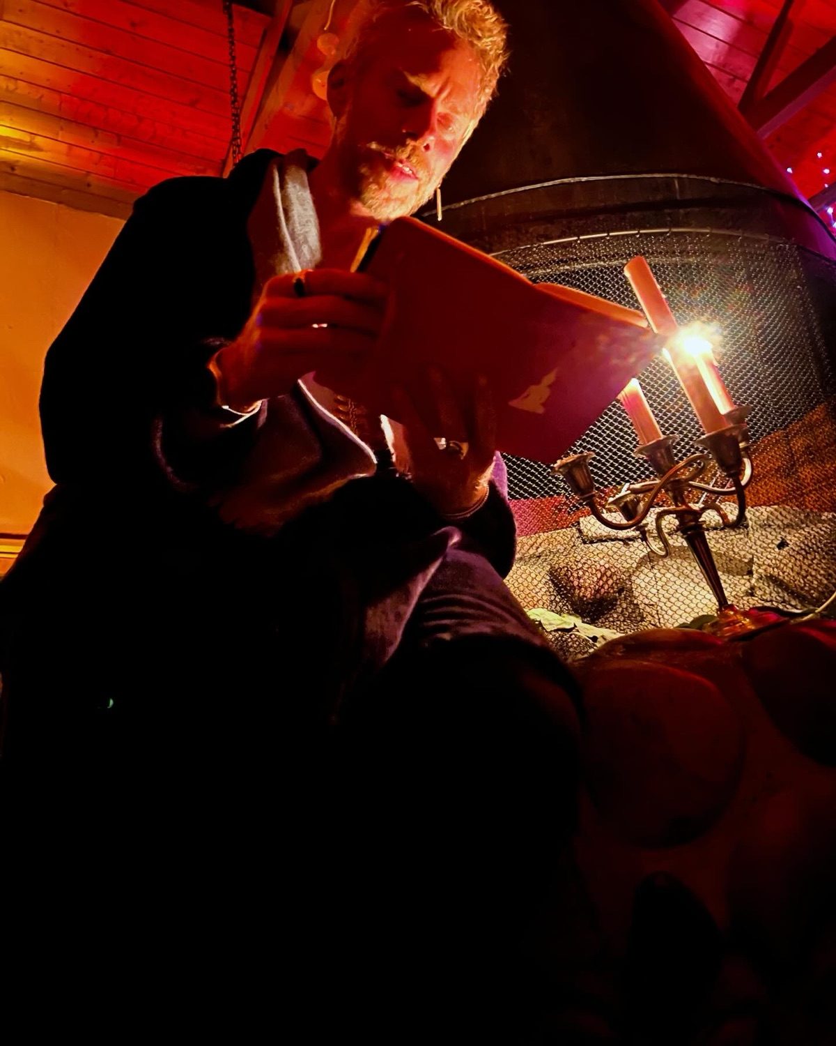 A candlelit room, the intimate setting of a 1:1 session